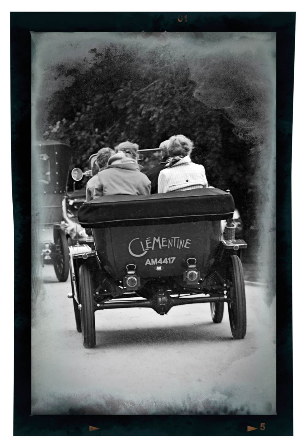 A vintage car called Clementine leaving Little Easton Country Fair