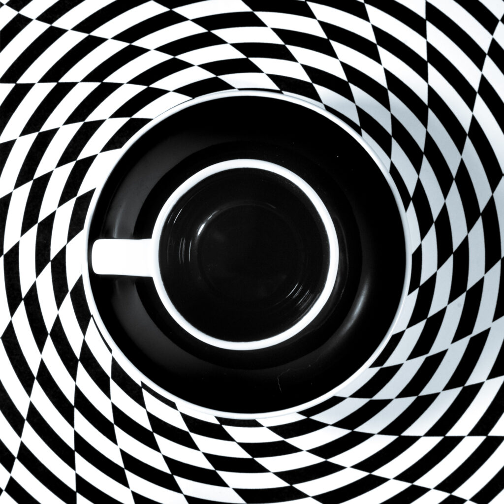 Black and White Unite IX Draining the vortex of coffee