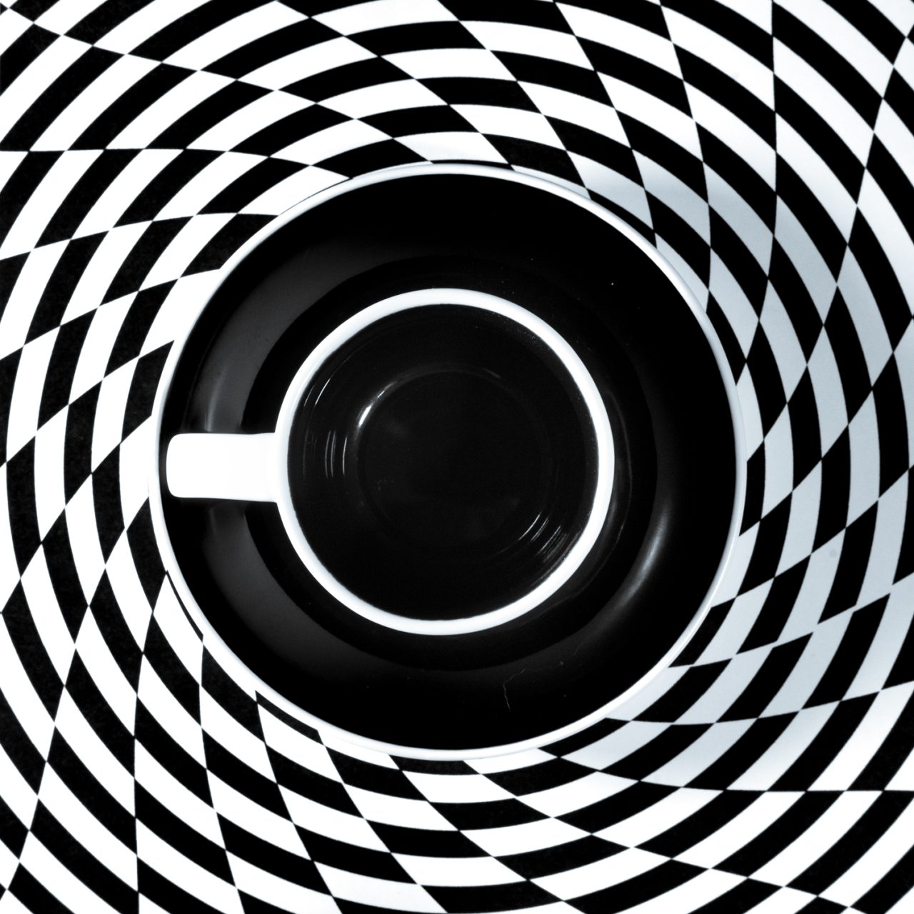 Black and White Unite IX Draining the vortex of coffee